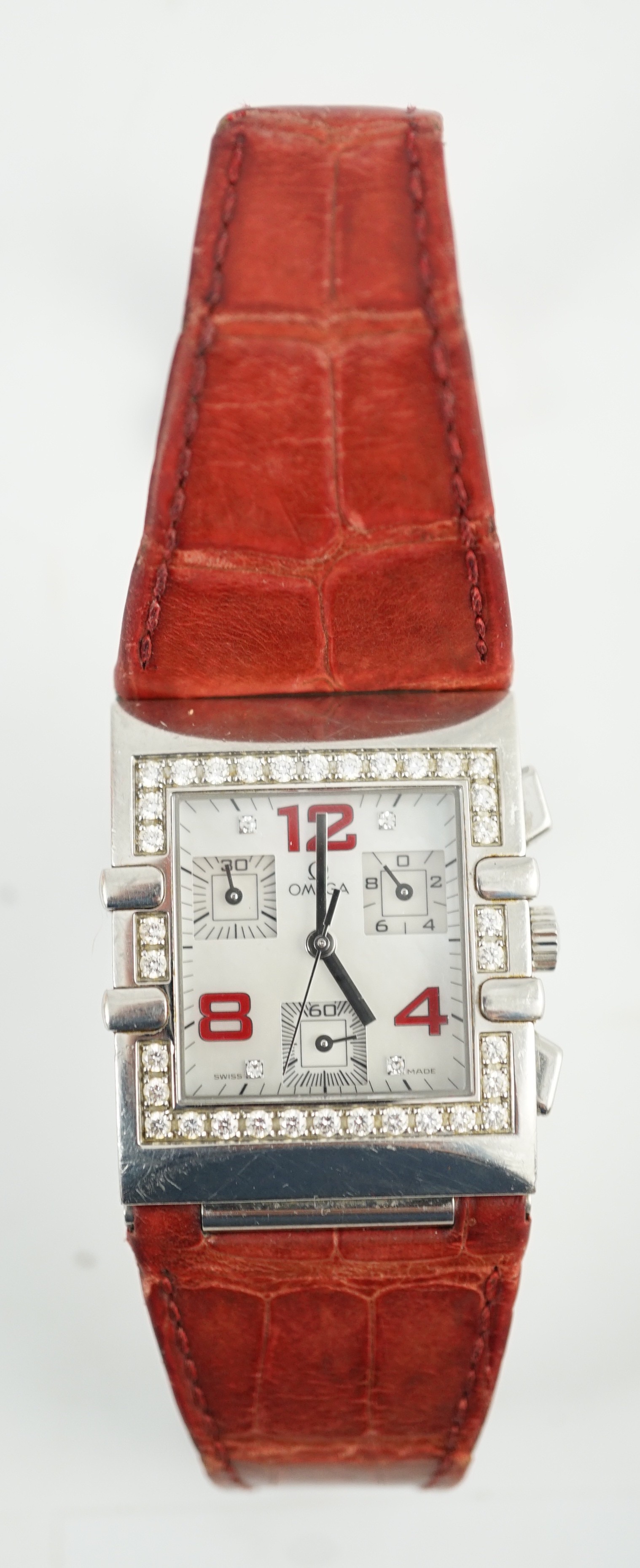 A lady's modern 2005 stainless steel Omega chronograph quartz rectangular wrist watch, with mother of pearl and diamond set dial and diamond set bezel
